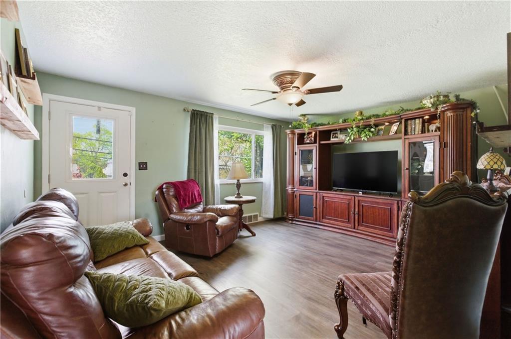 1630 Old Brodhead Road Monaca, PA 15061 - Photo 12 of 28 a living room with furniture and a flat screen tv