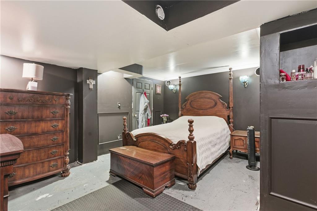 1630 Old Brodhead Road Monaca, PA 15061 - Photo 21 of 28 a bed room with a bed and a mirror