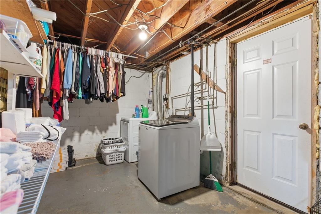 1630 Old Brodhead Road Monaca, PA 15061 - Photo 24 of 28 a view of walk in closet with clothes and shoes