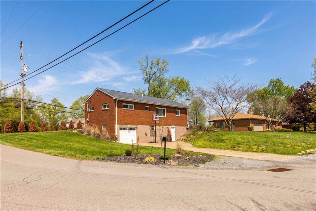 1630 Old Brodhead Road Monaca, PA 15061 - Photo 25 of 28 a front view of a house with a yard