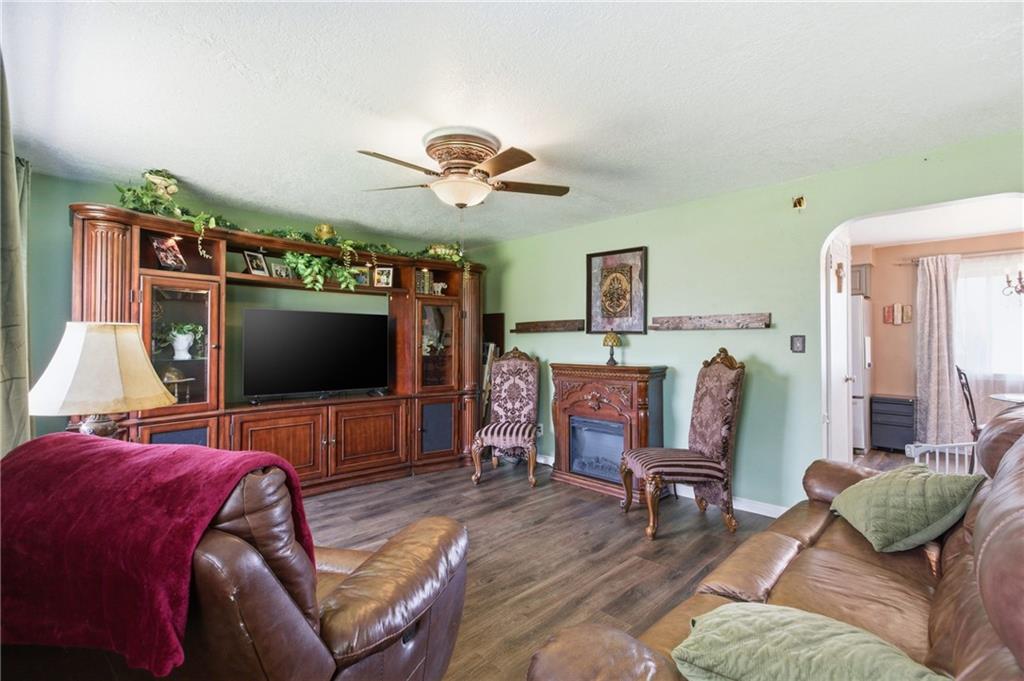 1630 Old Brodhead Road Monaca, PA 15061 - Photo 10 of 28 a living room with furniture and a flat screen tv