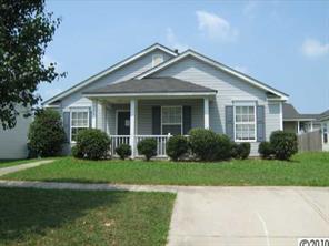 3084 Rockingham Court Southwest Concord, NC 28025 - Photo 1 of 1 a view of a house with a yard