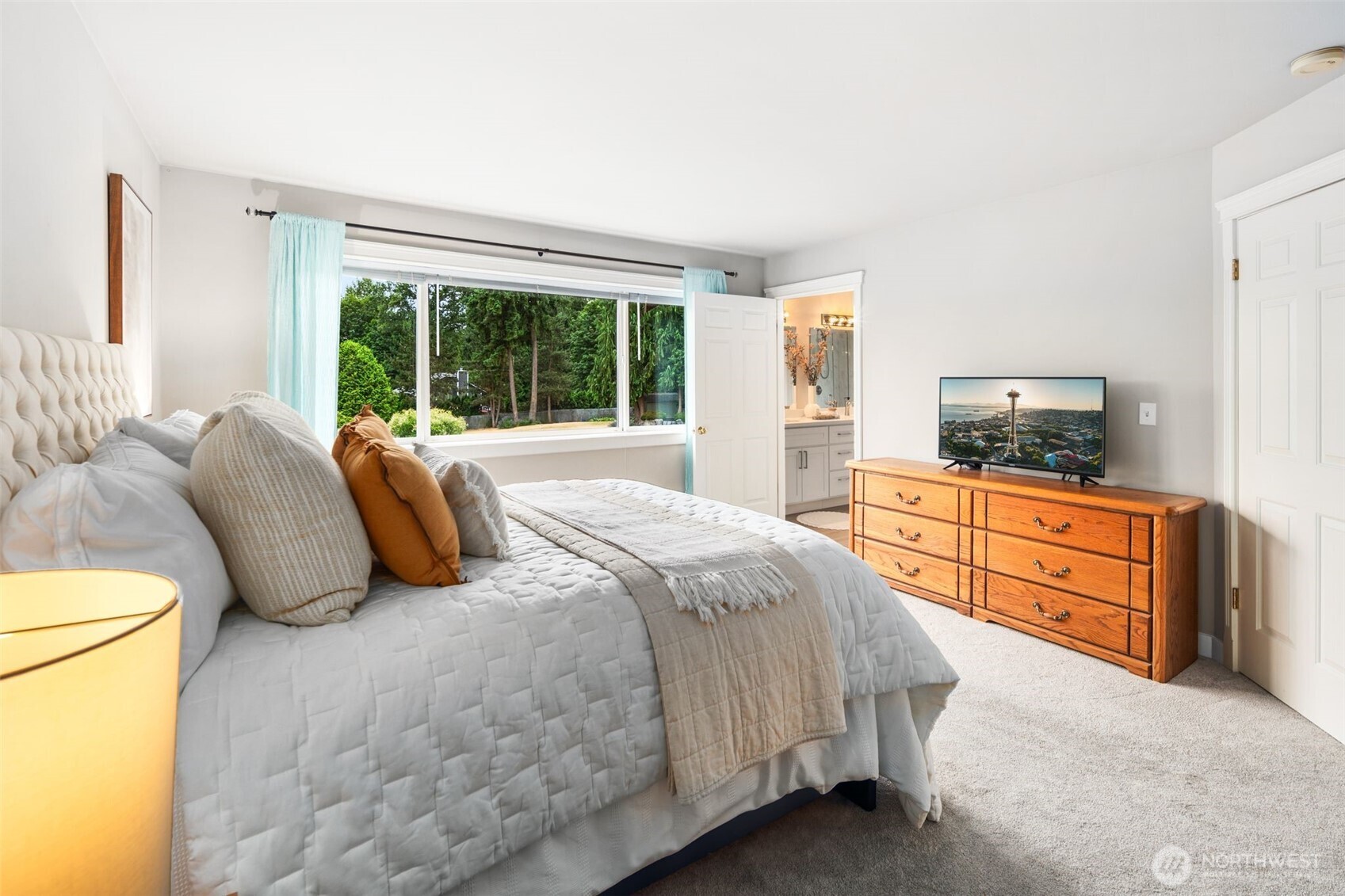 1514 232nd Place Southwest Bothell, WA 98021 - Photo 14 of 38 a bedroom with a bed and a dresser