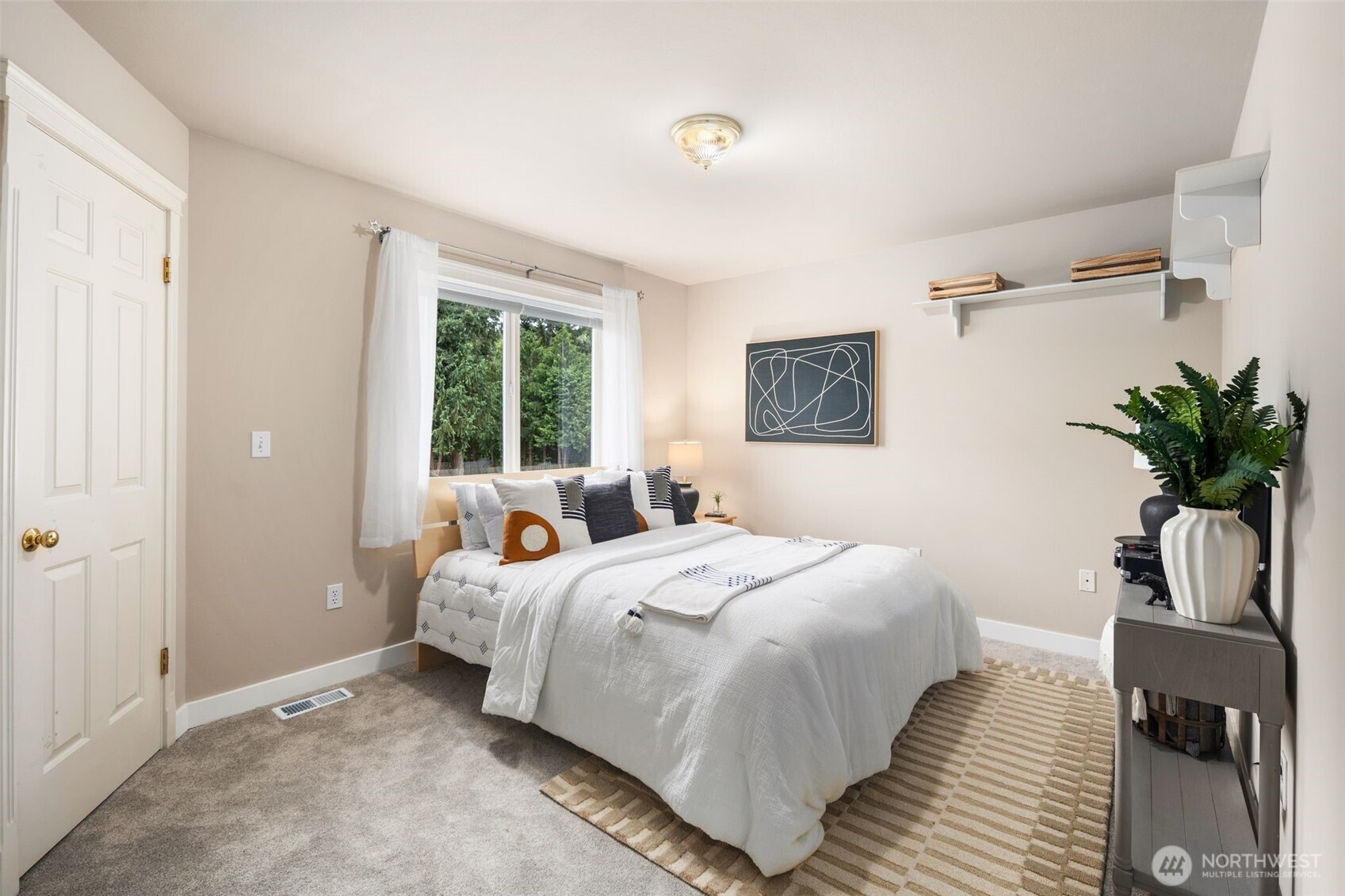 1514 232nd Place Southwest Bothell, WA 98021 - Photo 18 of 38 a bedroom with bed and a window