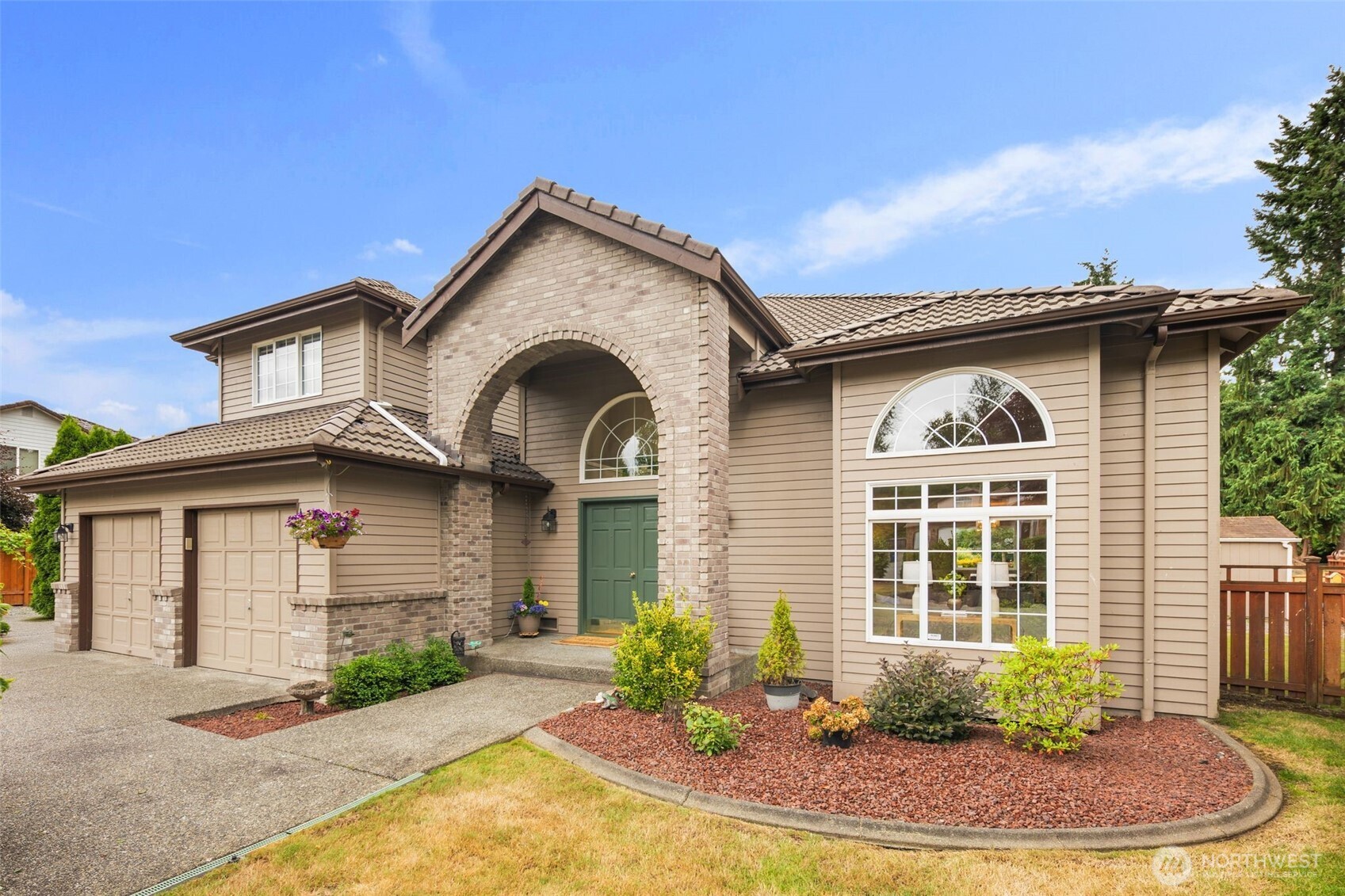 1514 232nd Place Southwest Bothell, WA 98021 - Photo 2 of 38 front view of a house with a yard