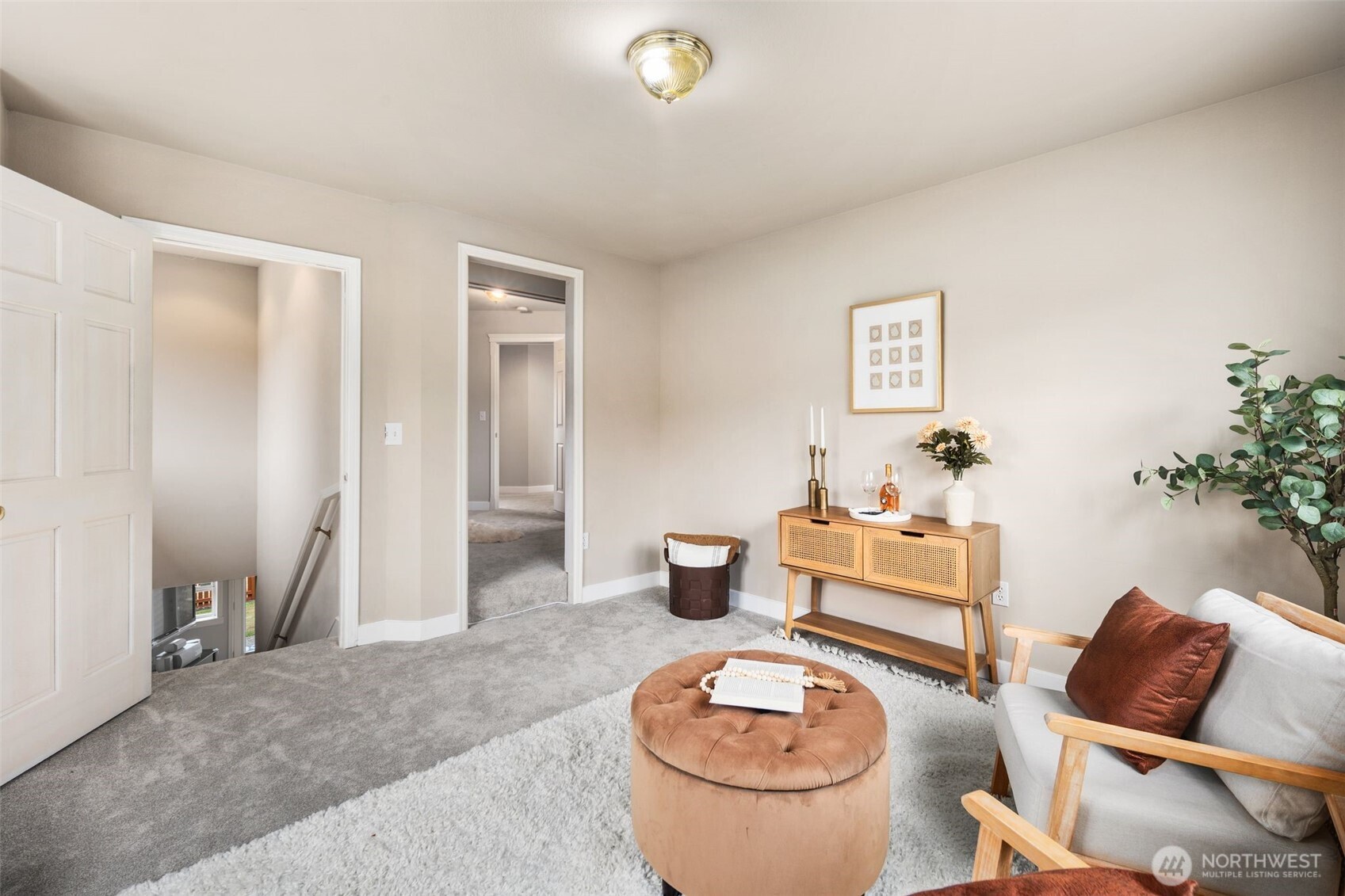 1514 232nd Place Southwest Bothell, WA 98021 - Photo 22 of 38 a living room with furniture and a table