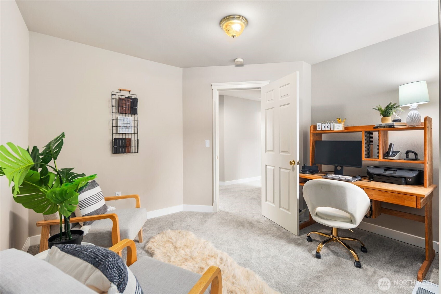1514 232nd Place Southwest Bothell, WA 98021 - Photo 23 of 38 a living room with furniture and a potted plant