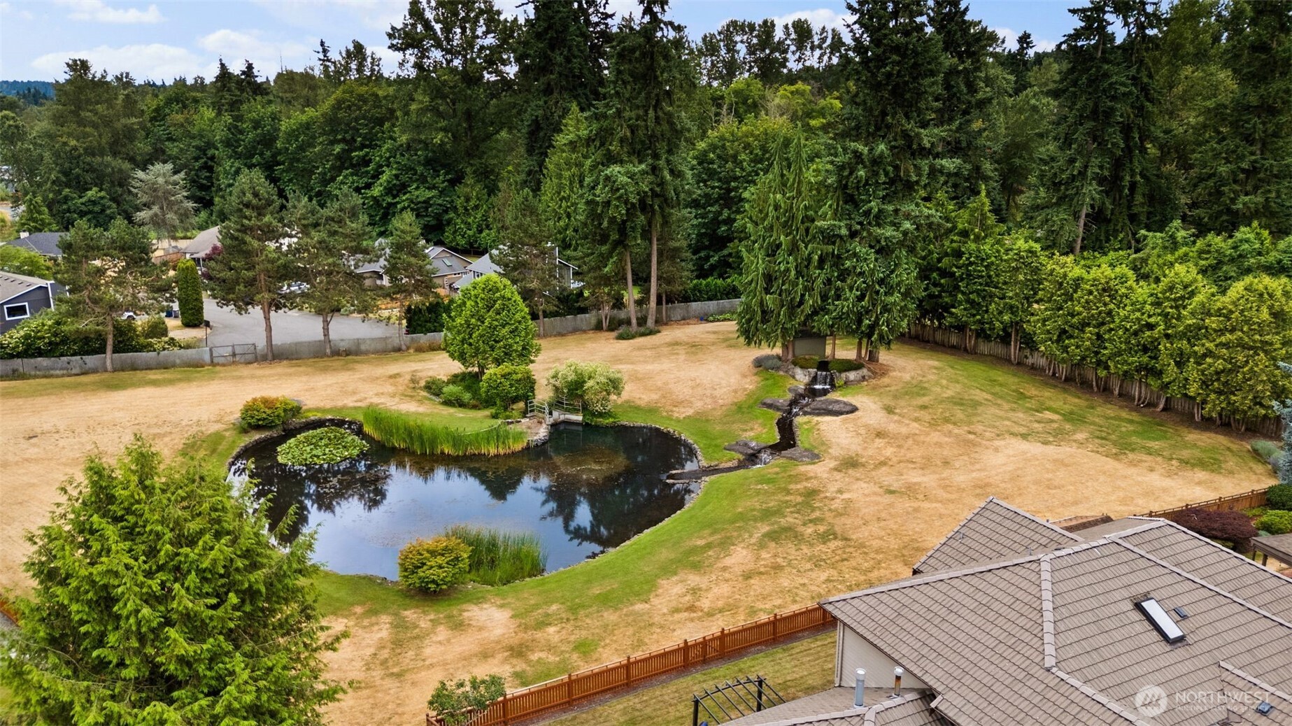 1514 232nd Place Southwest Bothell, WA 98021 - Photo 32 of 38 a view of a swimming pool with an outdoor seating area