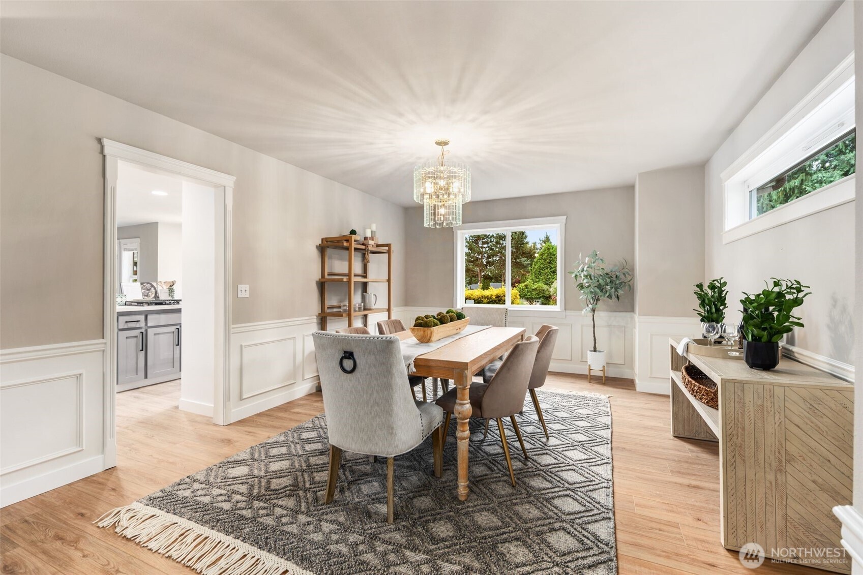 1514 232nd Place Southwest Bothell, WA 98021 - Photo 6 of 38 a view of a dining room with furniture window and wooden floor