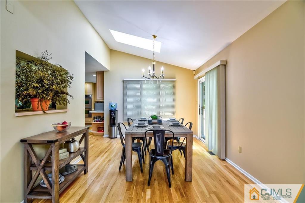 19 Thomas Road East Brunswick, NJ 08816 - Photo 18 of 37 a dining room with furniture and window