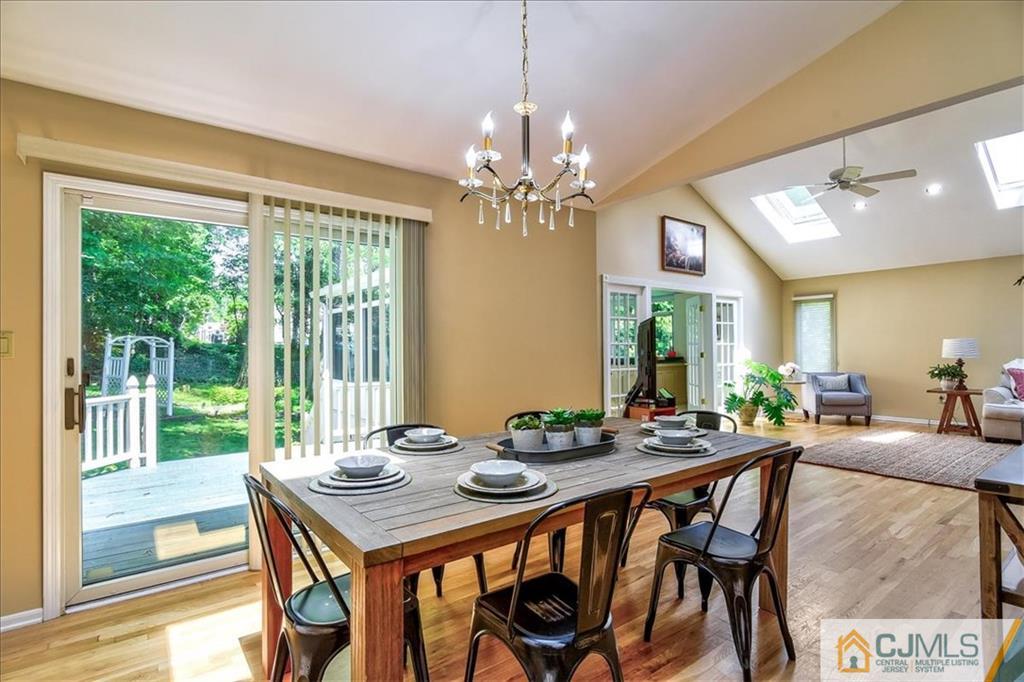 19 Thomas Road East Brunswick, NJ 08816 - Photo 20 of 37 a view of a dining room with furniture window and outside view
