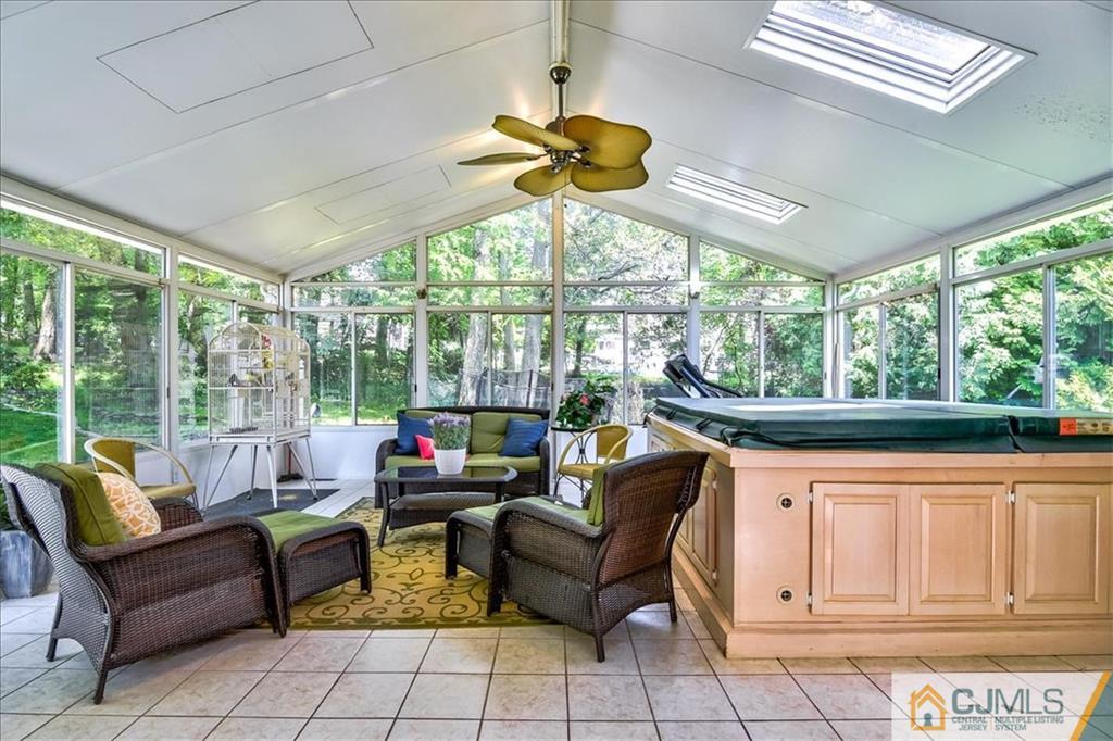 19 Thomas Road East Brunswick, NJ 08816 - Photo 23 of 37 a living room with furniture and a large window