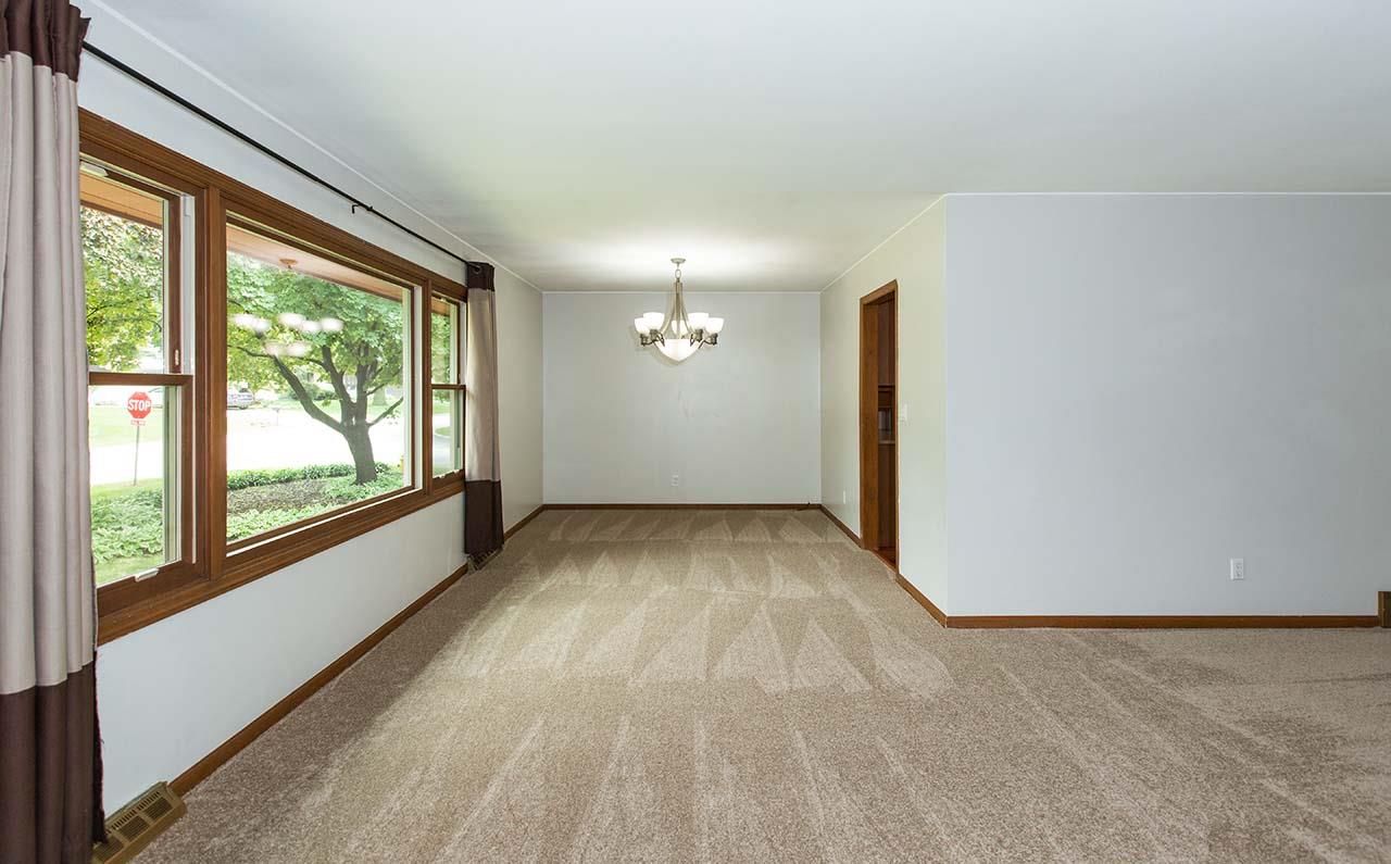 5221 Brookview Road Rockford, IL 61107 - Photo 5 of 25 a view of a room with large windows