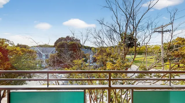 a view of a lake from a balcony