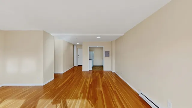 a view of a big room with wooden floor