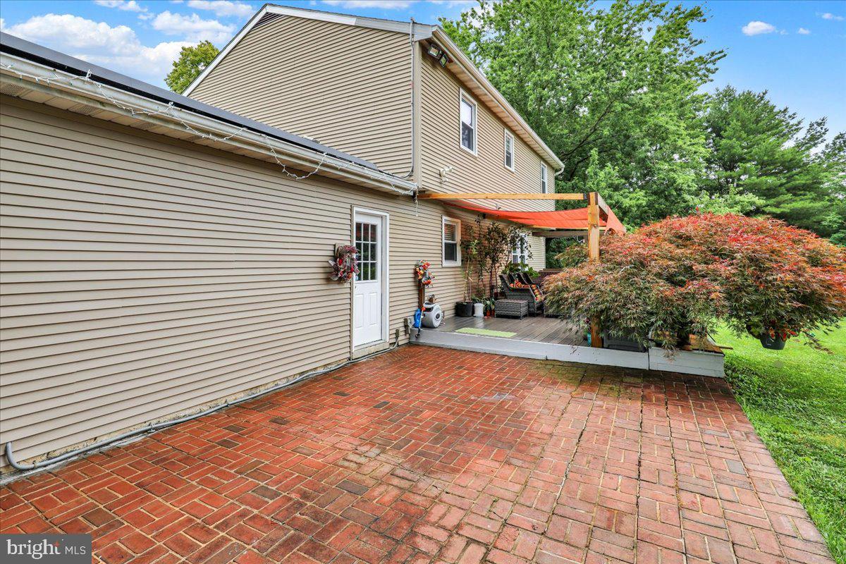 40 Hunters Run Road Honey Brook, PA 19344 - Photo 35 of 47 Charming patio with lush greenery.