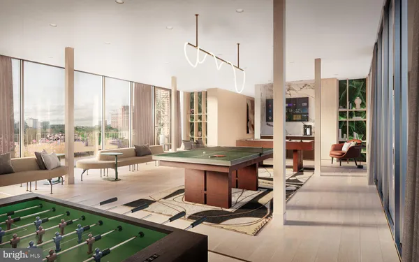 a living room with patio furniture and a floor to ceiling window