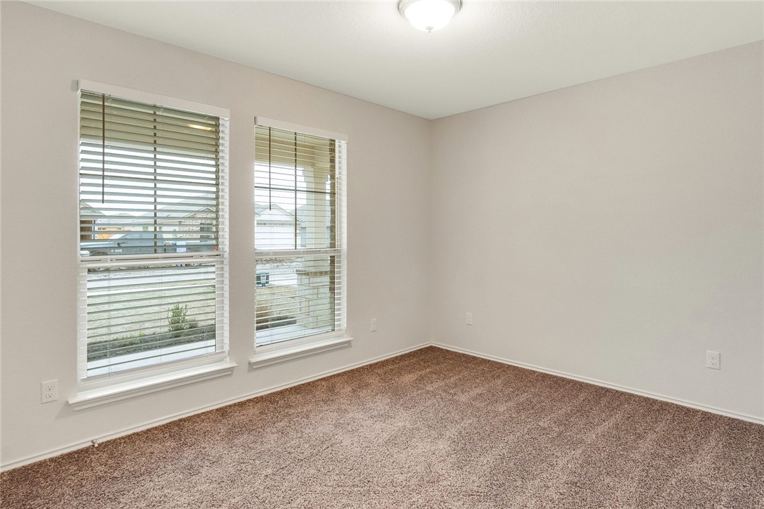 117 Nathaniel Drive Taylor, TX 76574 - Photo 14 of 26 a view of an empty room with a window