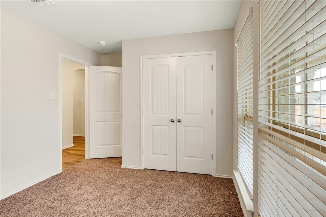 117 Nathaniel Drive Taylor, TX 76574 - Photo 15 of 26 a view of an empty room with a window