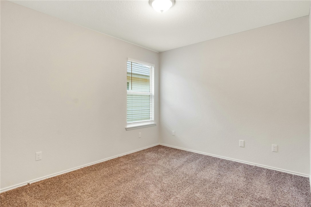 117 Nathaniel Drive Taylor, TX 76574 - Photo 16 of 26 an empty room with a window