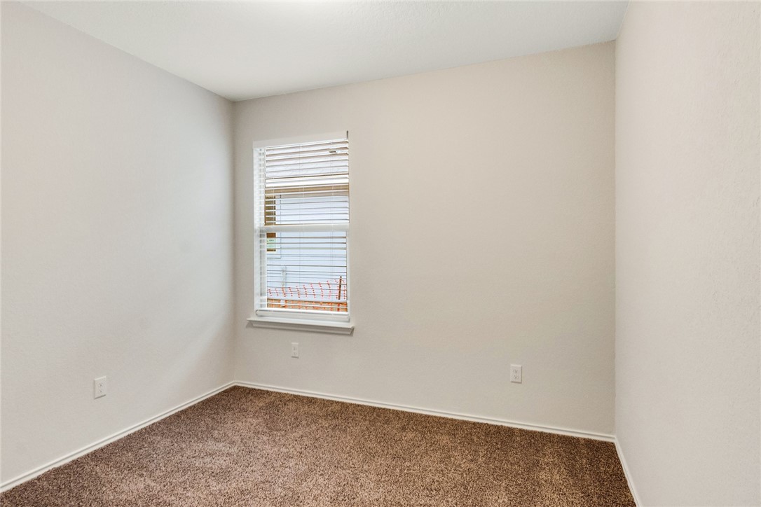 117 Nathaniel Drive Taylor, TX 76574 - Photo 18 of 26 a view of an empty room with a window