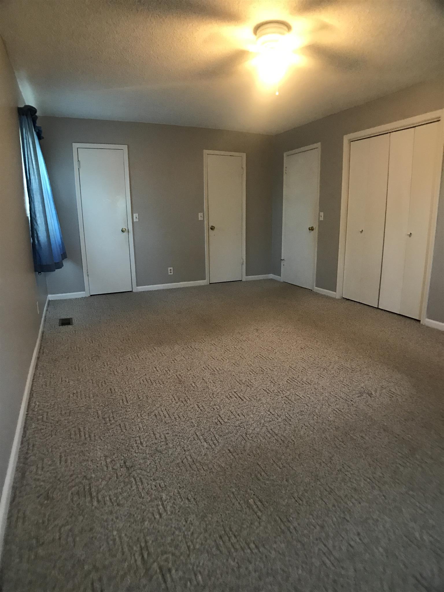 3404 Towneship Road Antioch, TN 37013 - Photo 27 of 28 Master bedroom with 2 walk in closets and a 3rd closet with folding doors