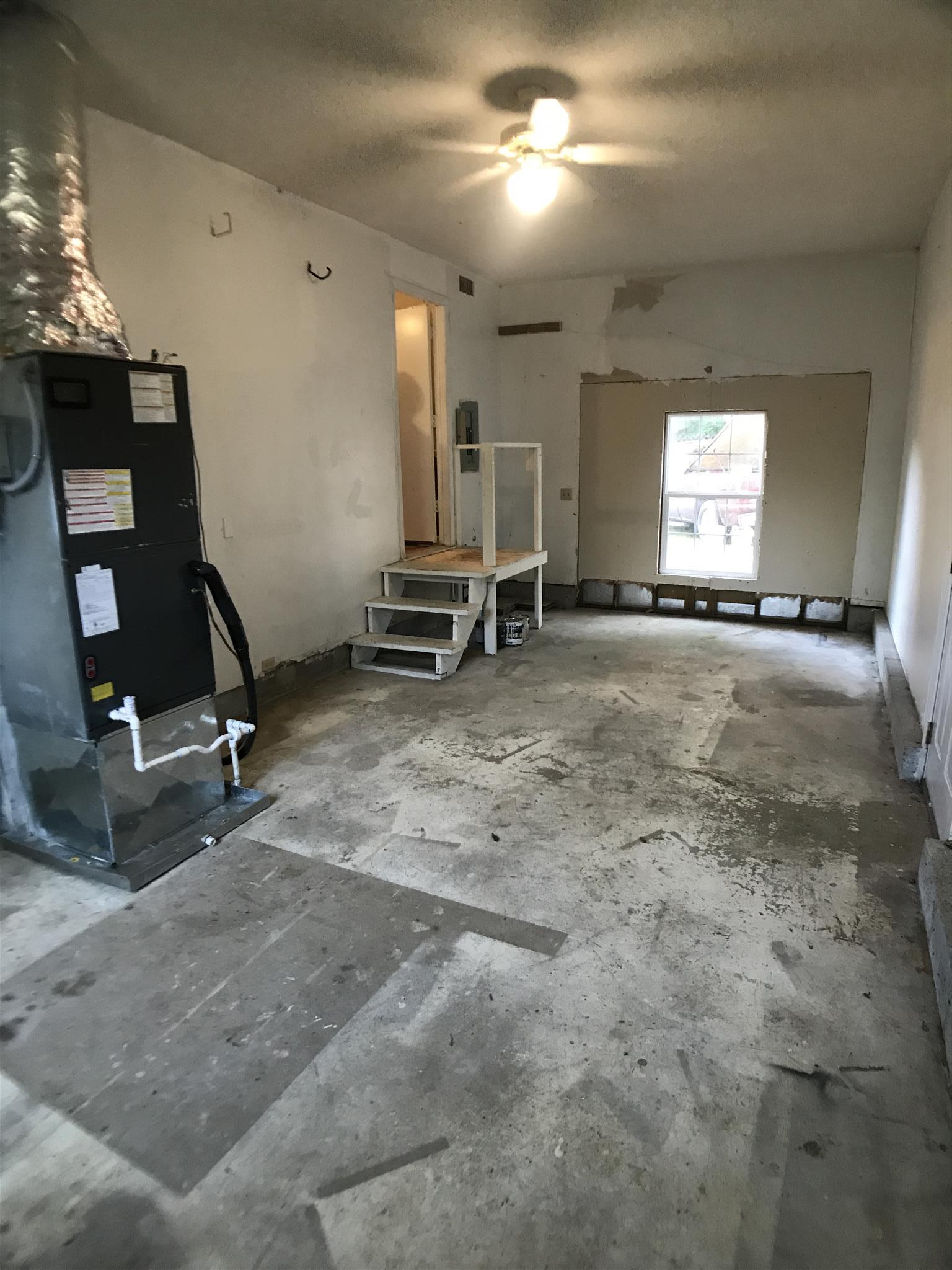 3404 Towneship Road Antioch, TN 37013 - Photo 9 of 28 24x12 garage that has been converted to storage and can be finished out to make a nice livable space.