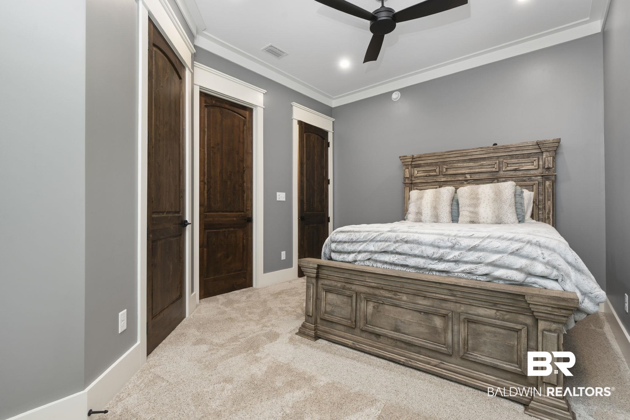 9501 Ben Hamilton Road Theodore, AL 36582 - Photo 34 of 69 Bedroom with ornamental molding, carpet floors, a closet, a ceiling fan, and recessed lighting