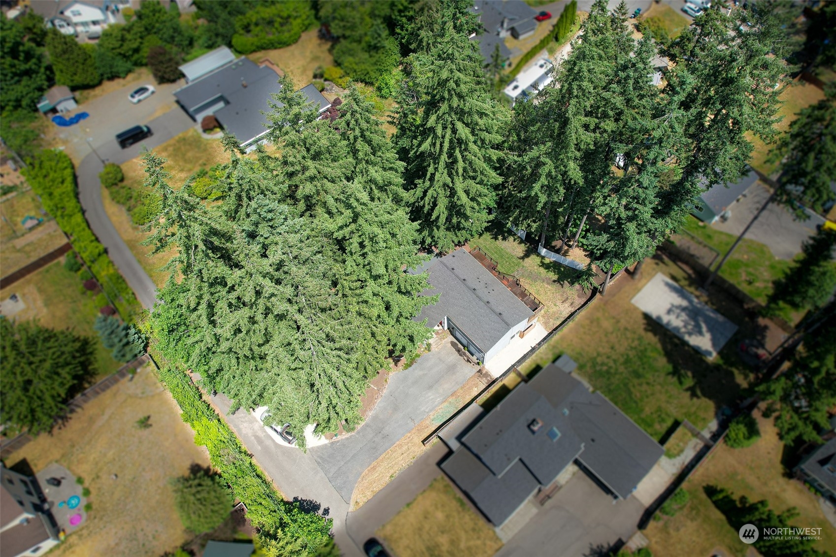 907 Harvest Road Bothell, WA 98012 - Photo 2 of 28 an aerial view of a house with a yard