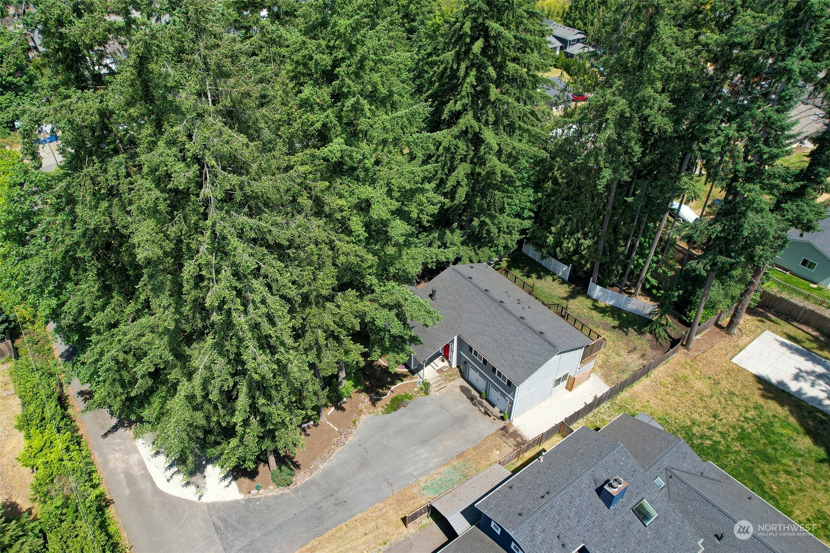 907 Harvest Road Bothell, WA 98012 - Photo 27 of 28 an aerial view of a house with a yard