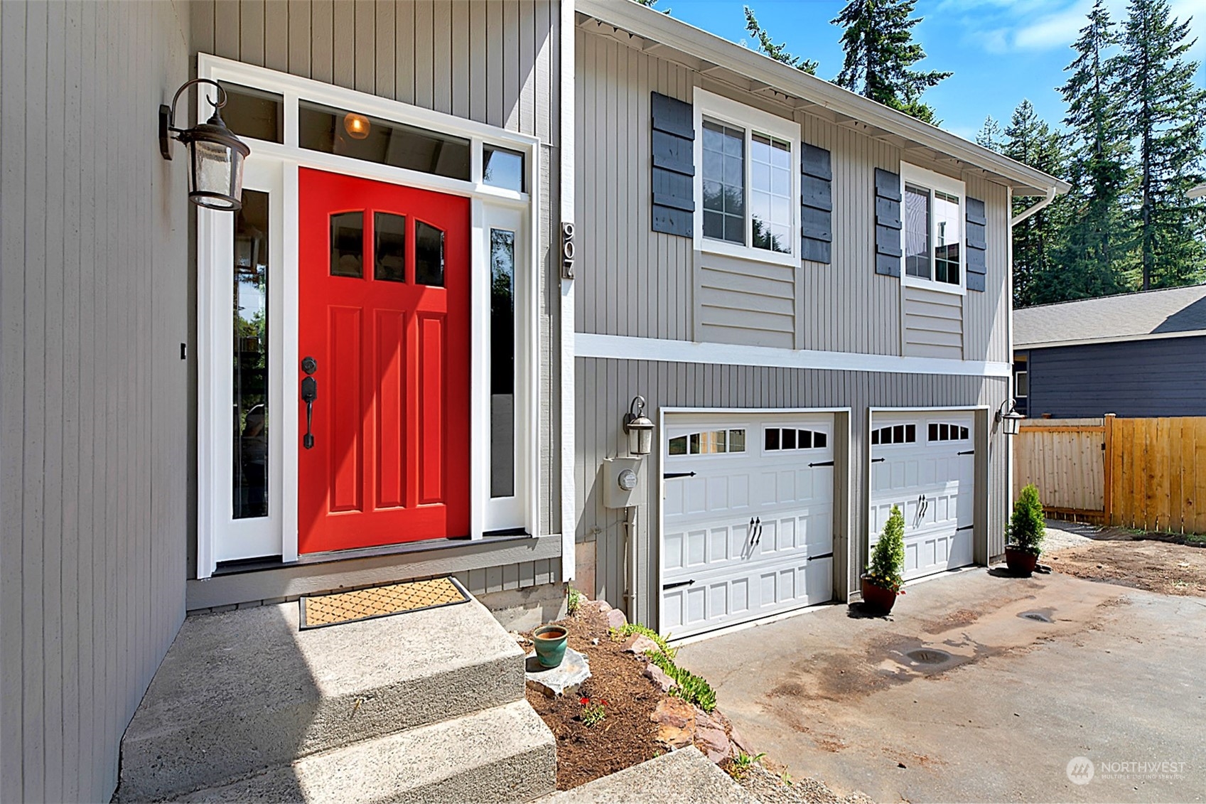 907 Harvest Road Bothell, WA 98012 - Photo 28 of 28 a front view of a house with a garage