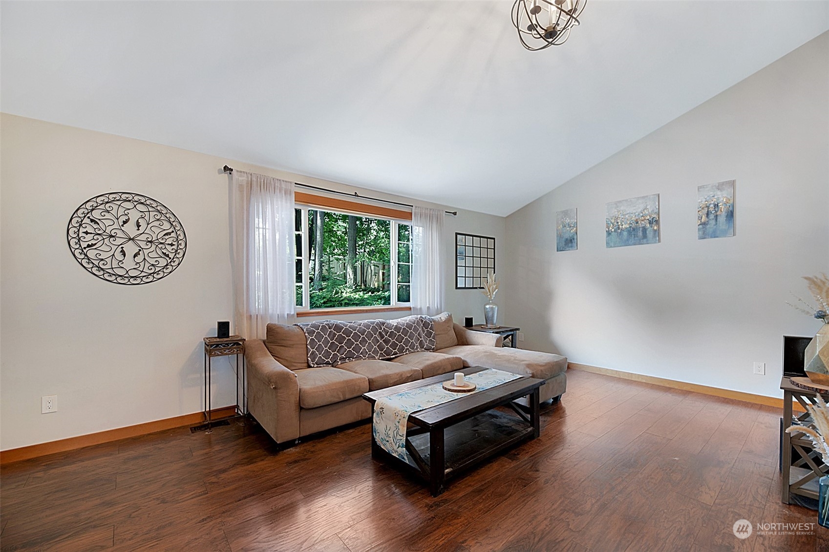 907 Harvest Road Bothell, WA 98012 - Photo 6 of 28 a living room with furniture and a window