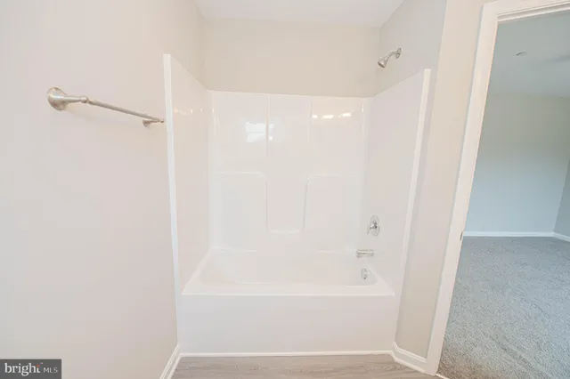 an empty room with a large window