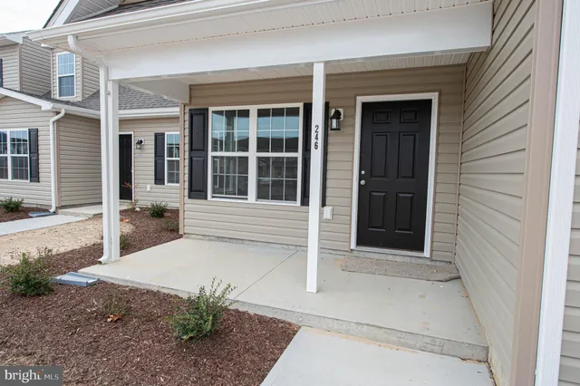 a house view with a garden space