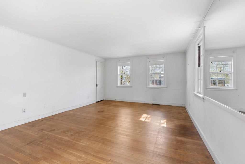 160 Reservoir Road Chestnut Hill, MA 02467 - Photo 22 of 42 an empty room with windows