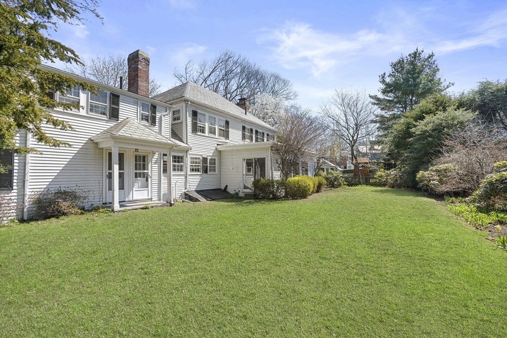 160 Reservoir Road Chestnut Hill, MA 02467 - Photo 25 of 42 a front view of a house with a yard