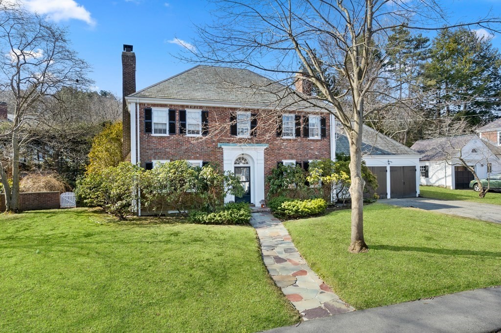 160 Reservoir Road Chestnut Hill, MA 02467 - Photo 33 of 42 a front view of a house with a yard