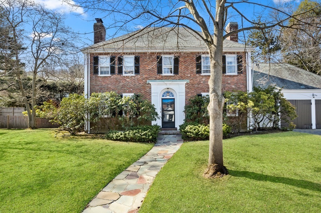 160 Reservoir Road Chestnut Hill, MA 02467 - Photo 35 of 42 a front view of a house with a yard