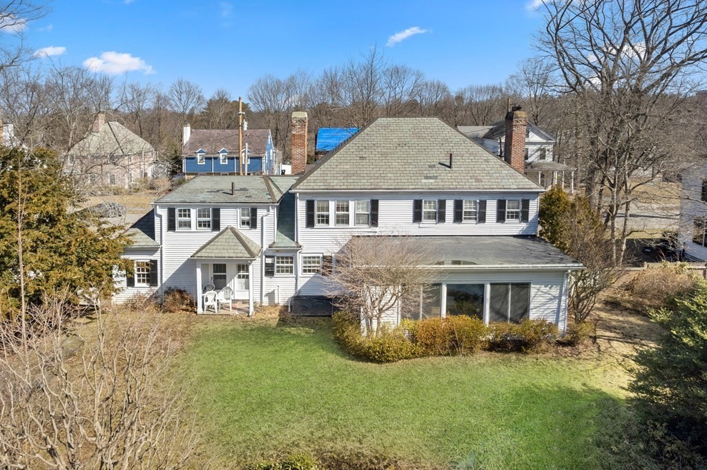 160 Reservoir Road Chestnut Hill, MA 02467 - Photo 38 of 42 a front view of a house with a yard