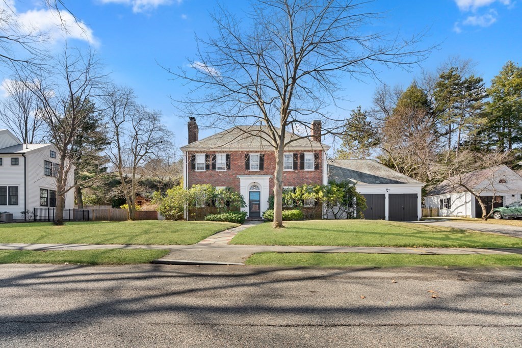 160 Reservoir Road Chestnut Hill, MA 02467 - Photo 40 of 42 a front view of a house with a yard