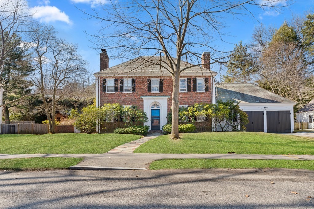 160 Reservoir Road Chestnut Hill, MA 02467 - Photo 41 of 42 a front view of a house with a yard