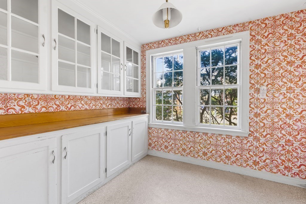 160 Reservoir Road Chestnut Hill, MA 02467 - Photo 7 of 42 a view of an empty room with a window