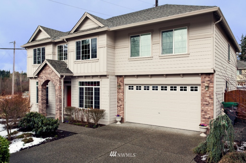 114 185th Place Southwest Bothell, WA 98012 - Photo 1 of 1 a view of a house with a garage