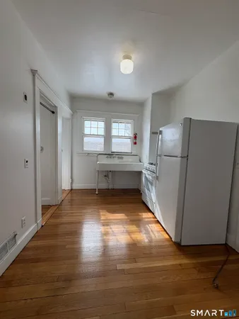 a view of kitchen and front door