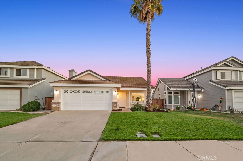 31577 Via Santa Ines Temecula, CA 92592 - Photo 1 of 49 a front view of a house with a yard and garage