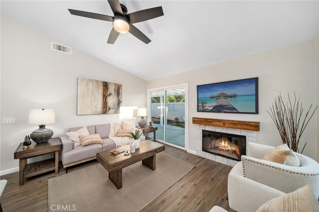31577 Via Santa Ines Temecula, CA 92592 - Photo 14 of 49 a living room with furniture and a fireplace