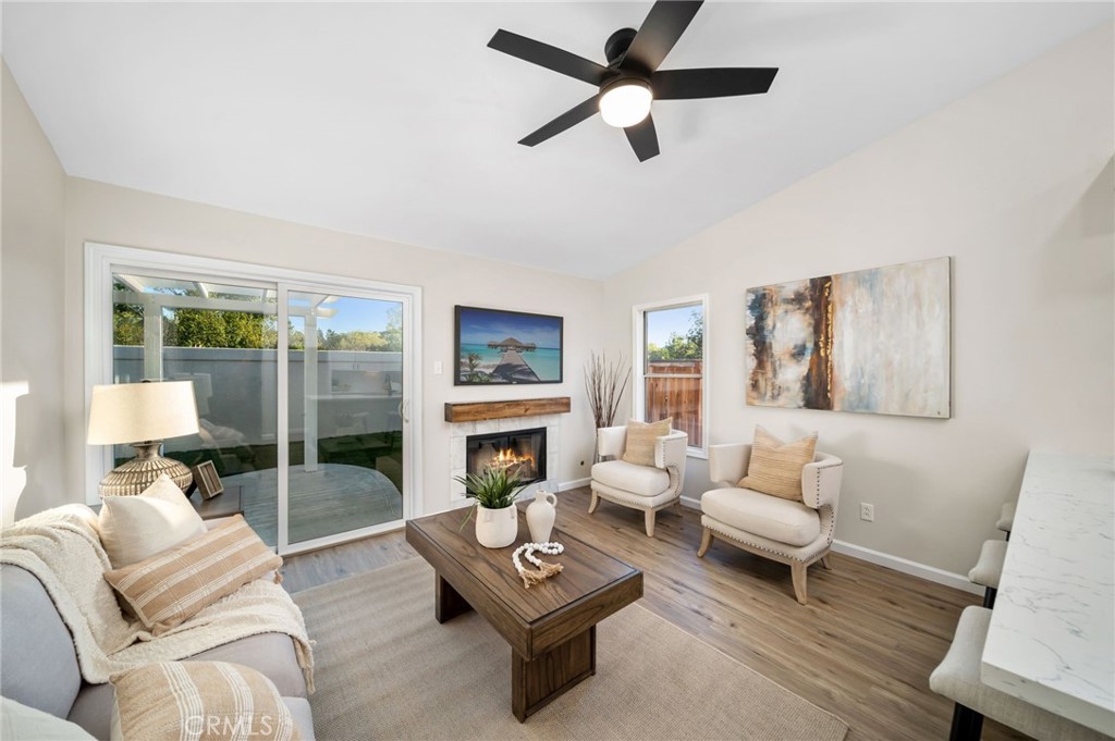 31577 Via Santa Ines Temecula, CA 92592 - Photo 15 of 49 a living room with furniture and a fireplace