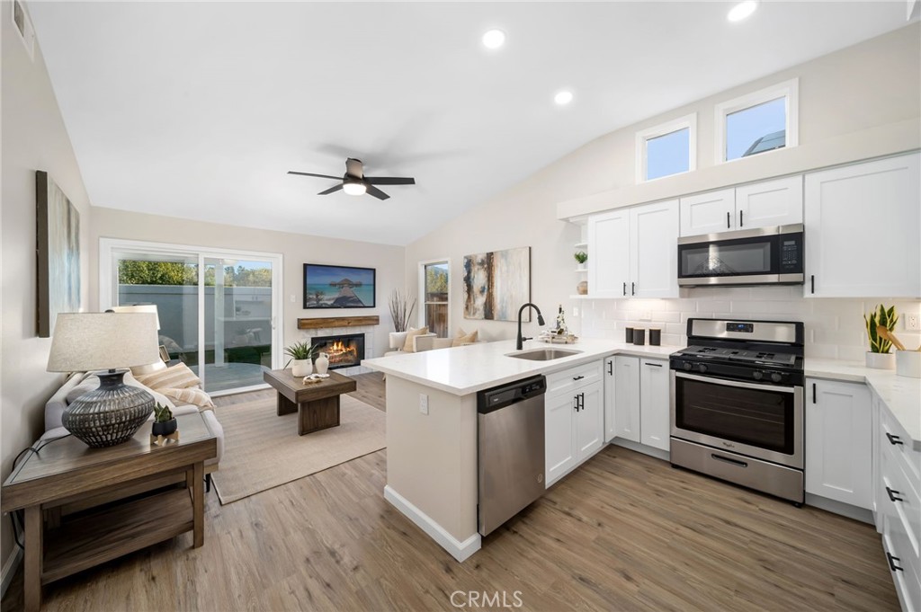 31577 Via Santa Ines Temecula, CA 92592 - Photo 19 of 49 a view of kitchen with sink stove and refrigerator
