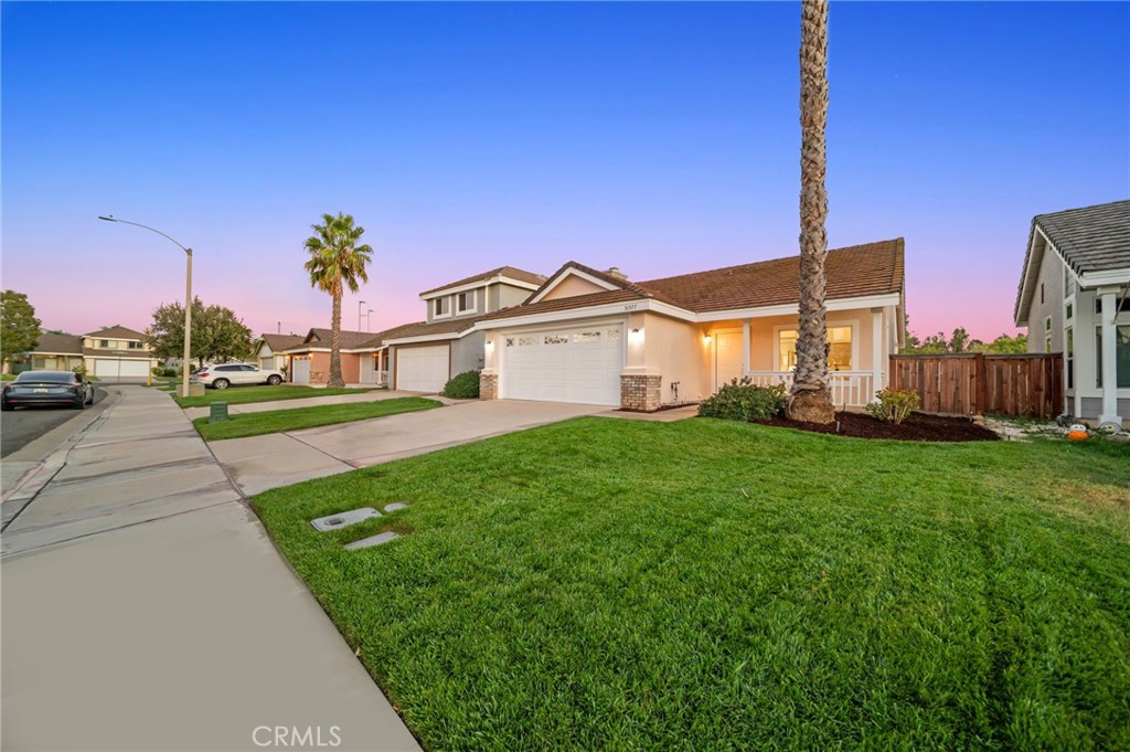 31577 Via Santa Ines Temecula, CA 92592 - Photo 2 of 49 a view of a house with a yard