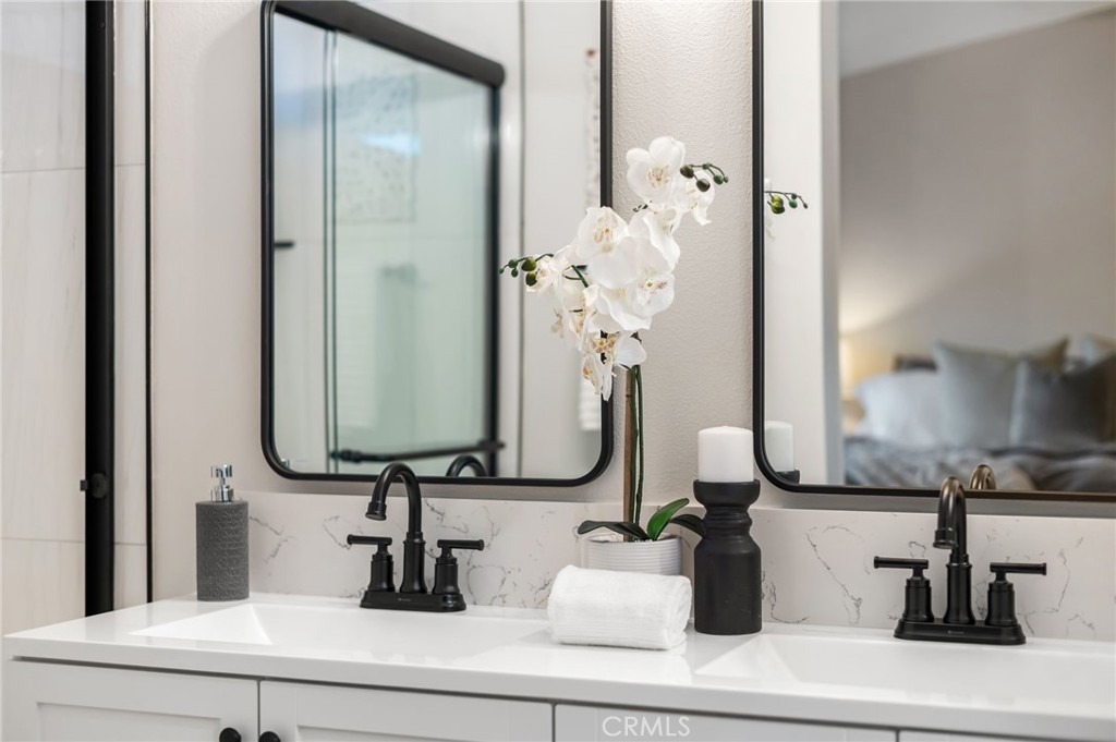 31577 Via Santa Ines Temecula, CA 92592 - Photo 30 of 49 a bathroom with a sink and a mirror